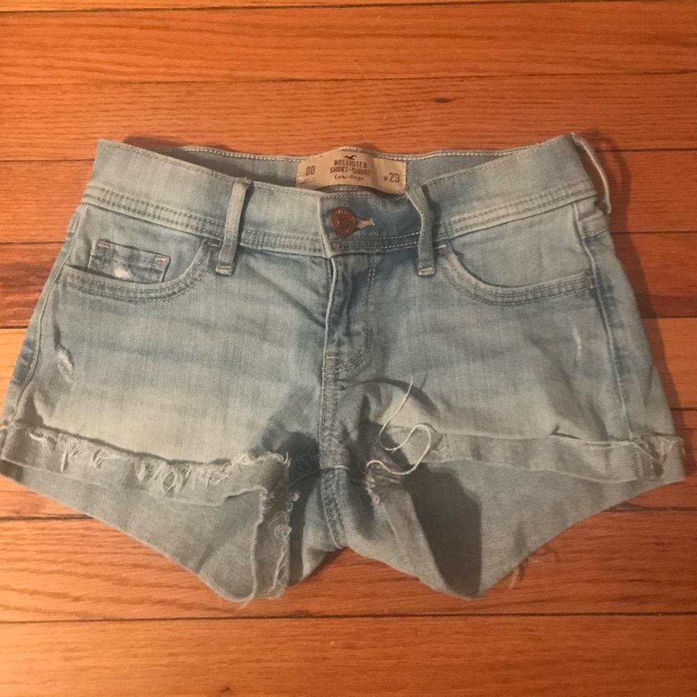 Low-rise, light-wash denim shorts